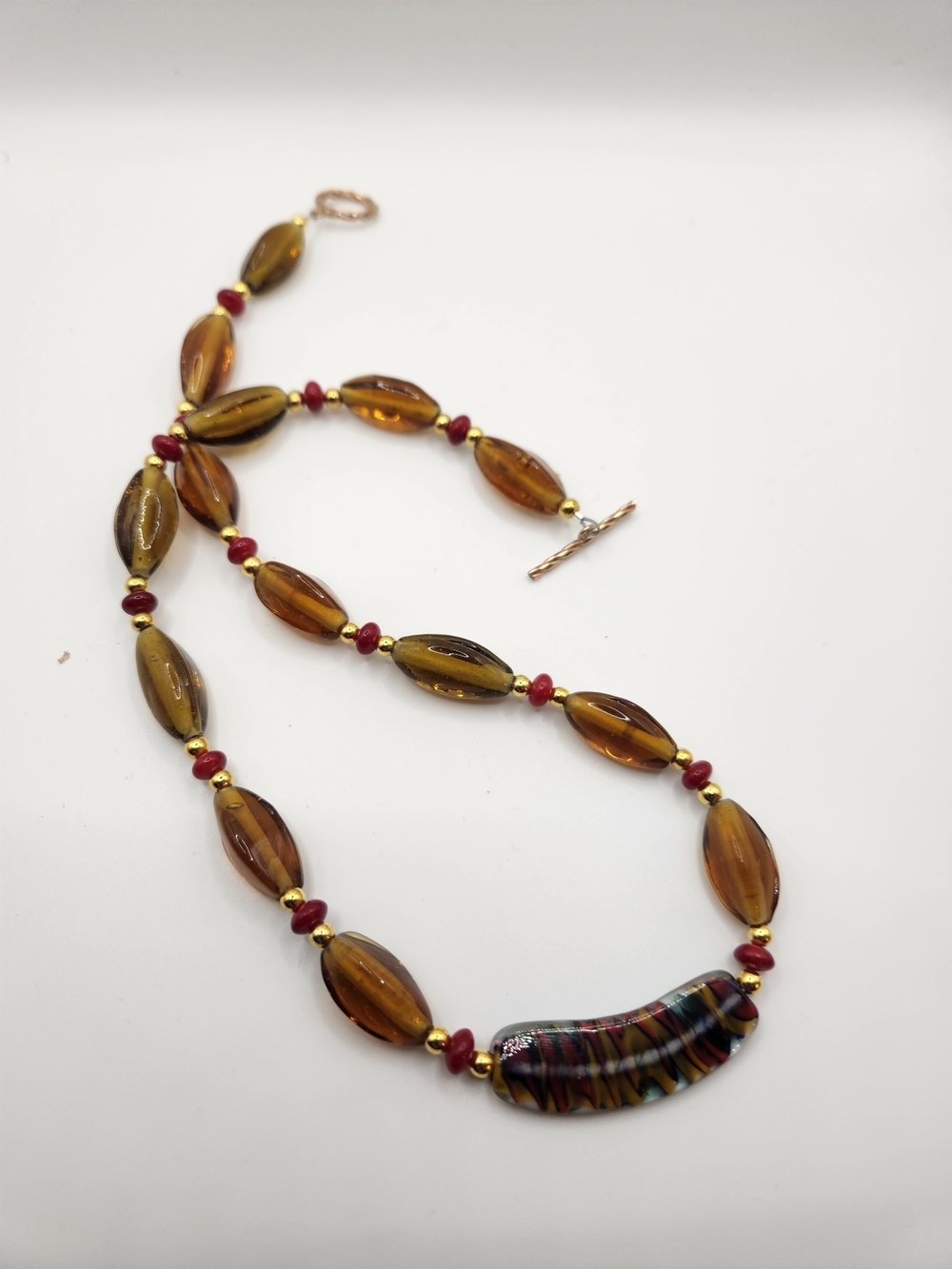 Amber Glass Bead Necklace with Red Accent Beads and Multicolor Focal